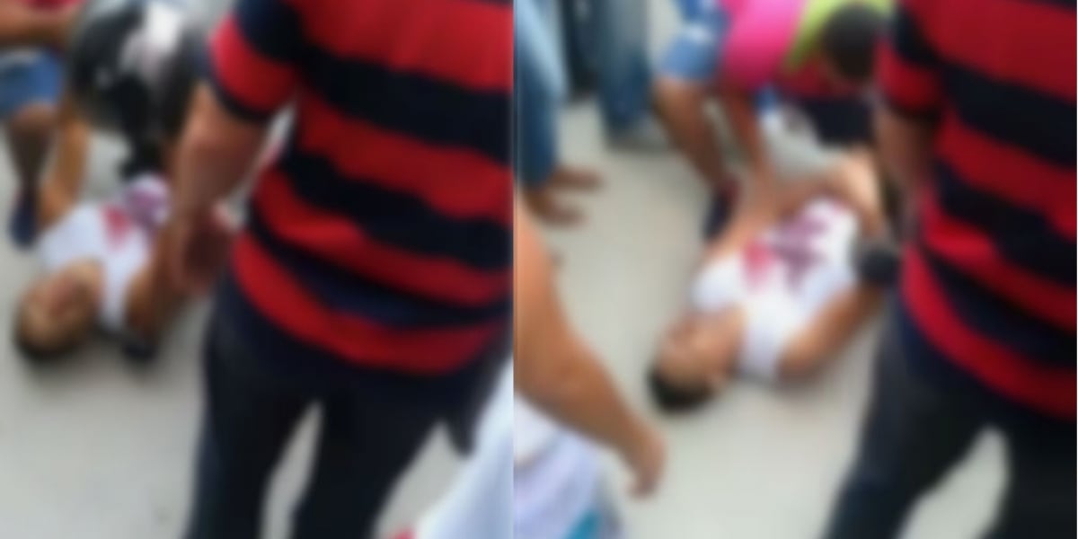 El hombre quedó tendido en una acera.