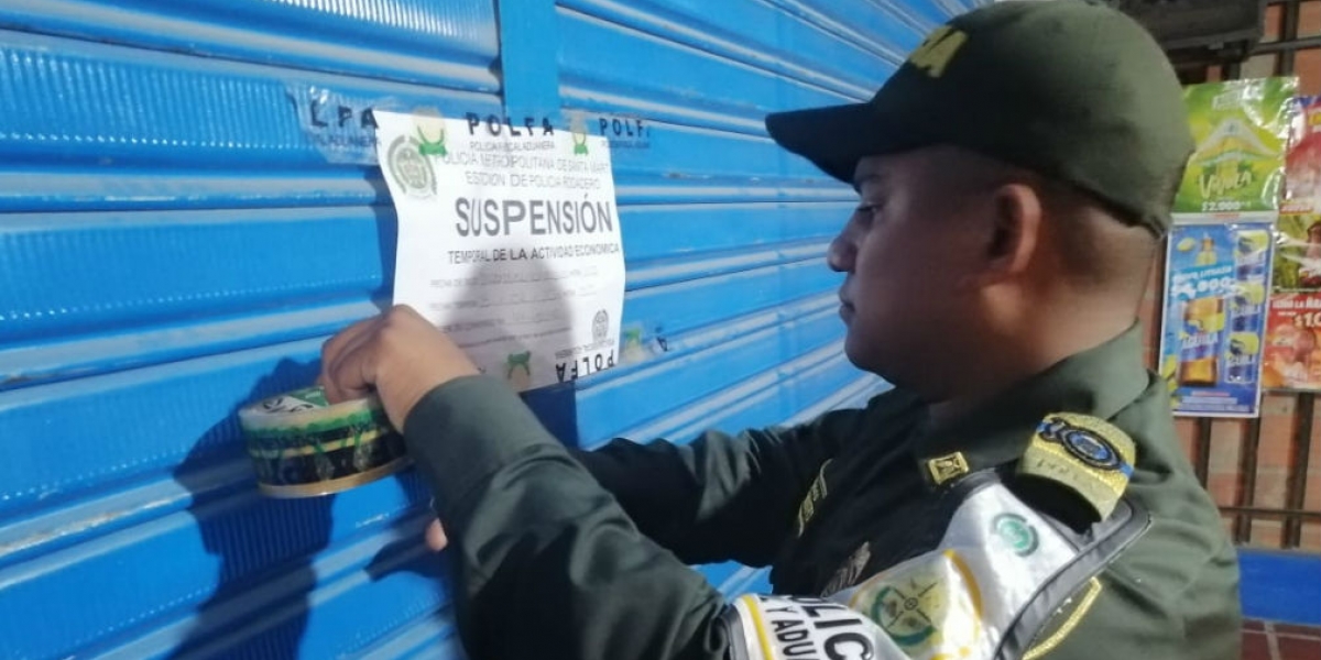 Policía Suspensión de los locales comerciales.