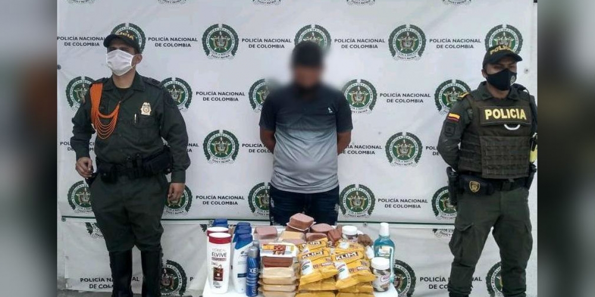 Policía David Suárez, capturado.