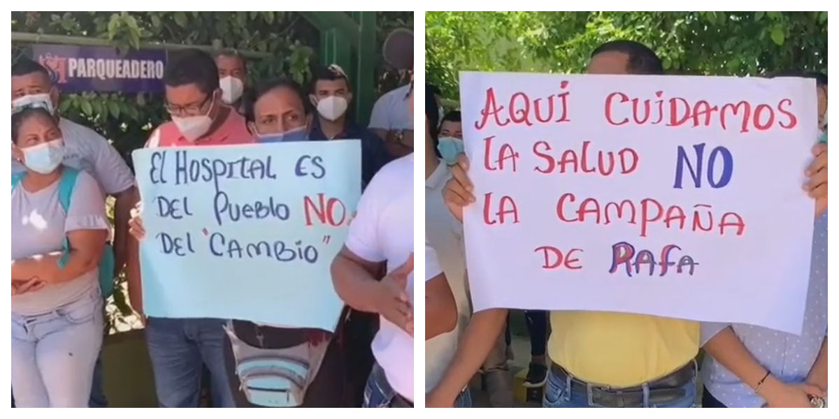 Pancartas de los trabajadores en una protesta en favor de la gerente del hospital.