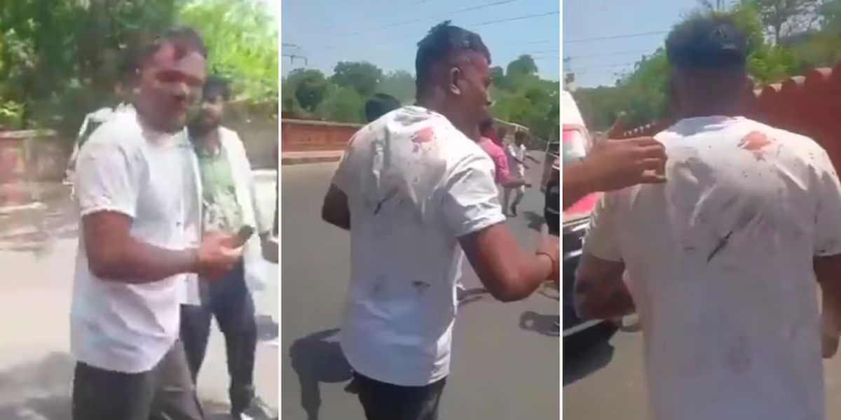 cortesía. Vishwash Kumar Ramesh caminando hacia una ambulancia.