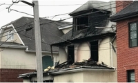  Casa incendiada donde murieron 4 personas en Brooklyn.