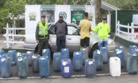 Andrés Felipe Moncada Sánchez  y un menor de edad capturado por contrabando de gasolina.