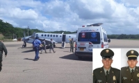 Los policías heridos Jindarwin Jiménez Badillo y Geovanny Palomino Quibalo.