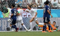 Jugadores de Polonia celebran el gol ante Japón. 