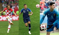 El croata Luka Modric, el francés Kylian Mbappe y el belga Thibaut Courtois