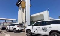 El camión de valores que aparece junto a las dos camionetas de la ONU.