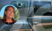Lissi Judith Camargo Noriega y la camioneta baleada.