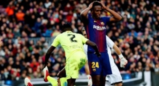 Zona Cero.  El defensa colombiano del Barcelona Yerry Mina (d) en su partido ante el Getafe.