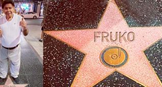 'Fruko' en su estrella en el Paseo de la Fama.