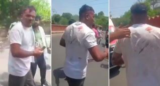 Vishwash Kumar Ramesh caminando hacia una ambulancia.