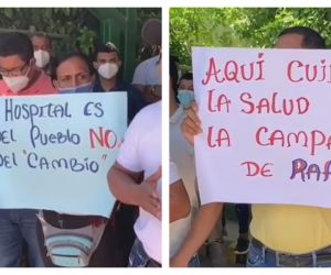 Pancartas de los trabajadores en una protesta en favor de la gerente del hospital.