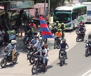 Motorizados en las manifestaciones de este jueves.