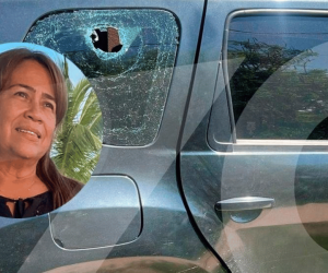 Lissi Judith Camargo Noriega y la camioneta baleada.