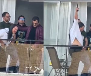 Captura de pantalla de la mujer disparando en un balcón de un apartamento en Bogotá 