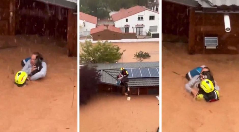 mujer siendo rescatada con su mascota.
